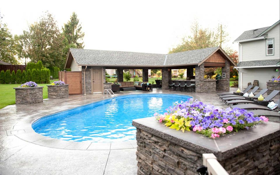 Outdoor living - backyard with pool and eating area